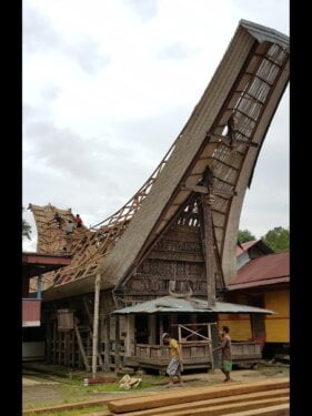 Our worker removed the roof of the antique hand carved Toraja